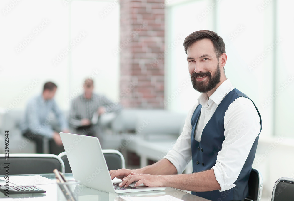 businessman sitting at his Desk in the office businessman sitting at his Desk in the office