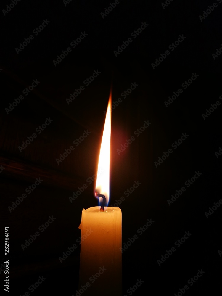 candle, light, flame, fire, dark, wax, candlelight, burning, black,  darkness, night, burn, heat, christmas, candles, hope, religion, yellow,  red, bright, celebration, romance, holiday Stock 写真 | Adobe Stock