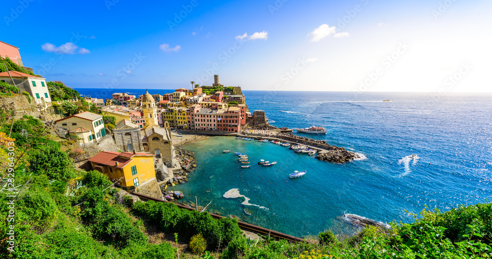 Vernazza - Village of Cinque Terre National Park at Coast of Italy. Beautiful colors at sunset. Province of La Spezia, Liguria, in the north of Italy - Travel destination and attractions in Europe.