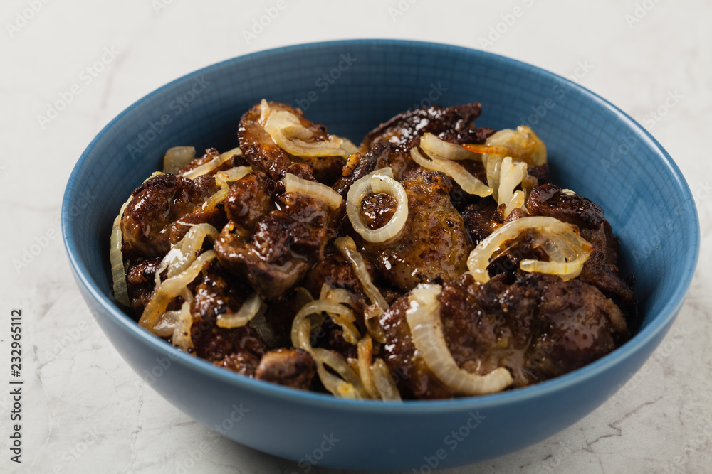 Fried chicken liver with onions.