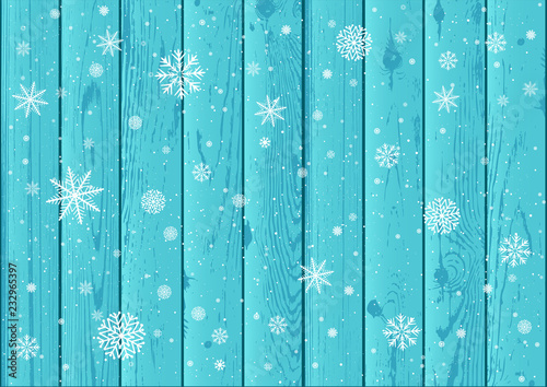 snowfall and blue wood background