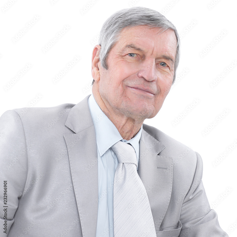 Closeup portrait of a smart senior man smiling on white backgrou Closeup portrait of a smart senior man smiling on white backgrou