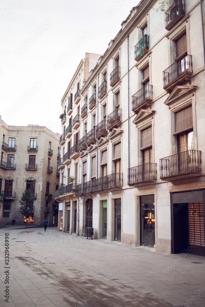 Old Buildings on Cucurulla Street in Barcelona, Spain. Empty Barcelona Street.