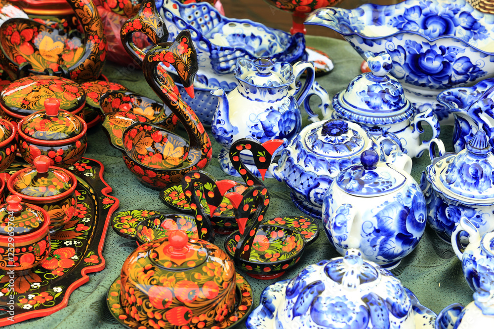 utensils painted in the style of Gzhel and Khokhloma
