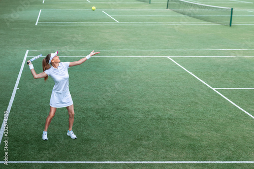 Young woman on the tennis court