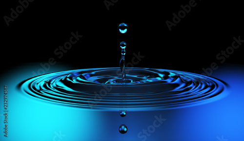Water Surface Drop Splash in Blue Light