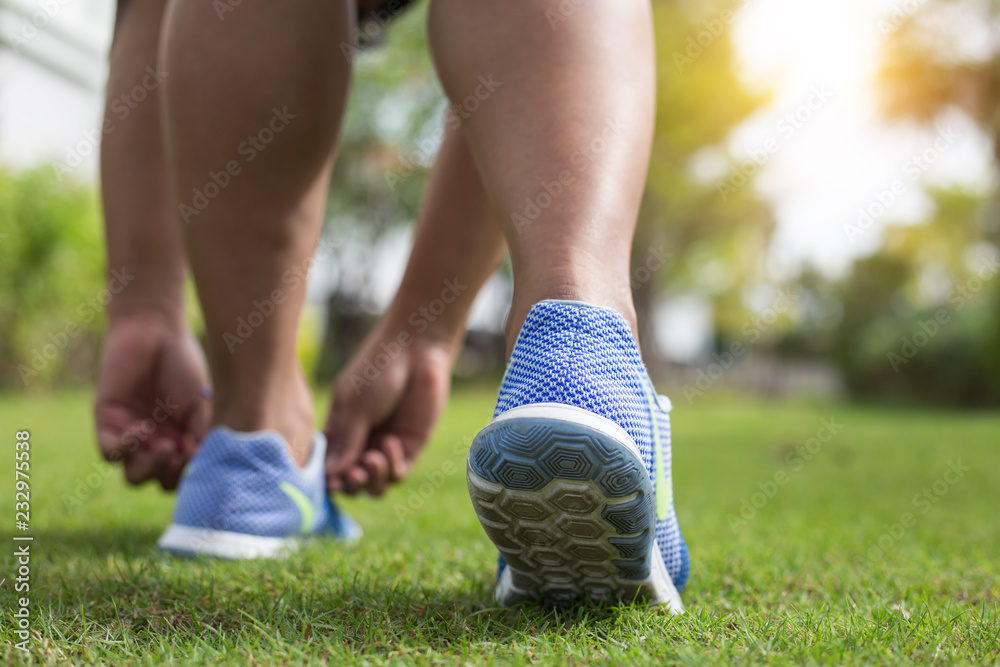 Women running jogging in nature. On the lawn in the morning..