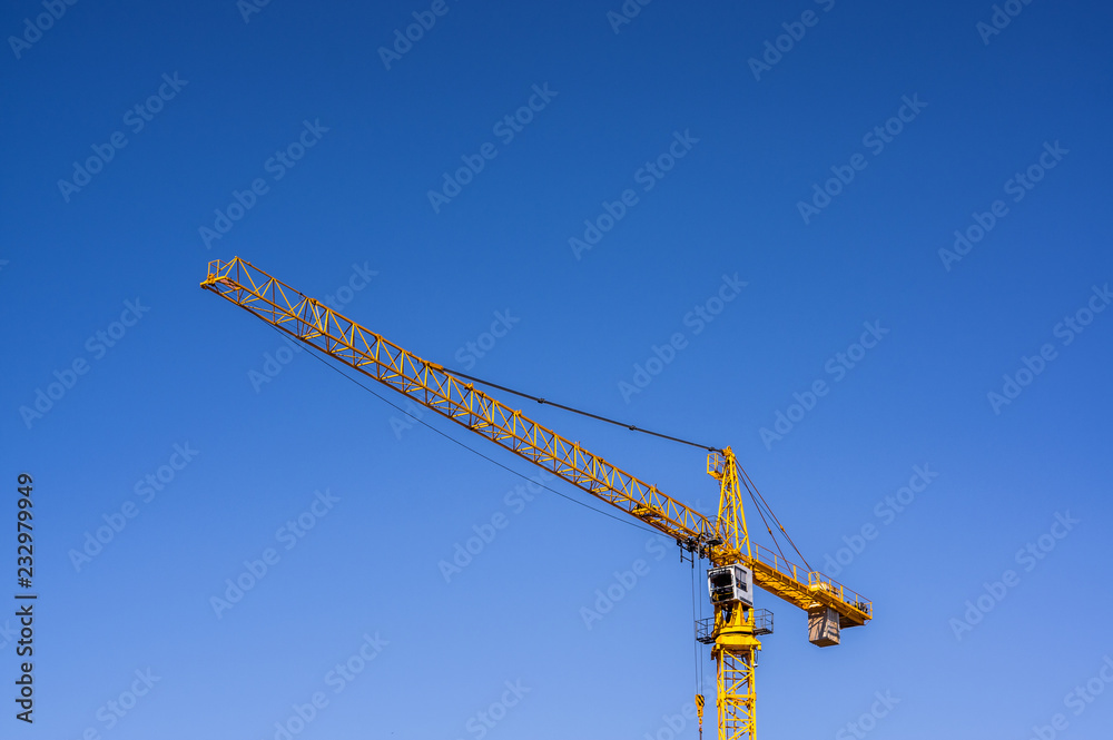construction crane on blue sky background construction crane on blue sky background