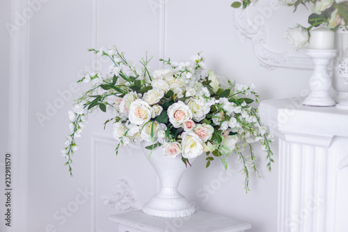 Wedding bouquet of white roses in a vase. Wedding decorations. White Rose.