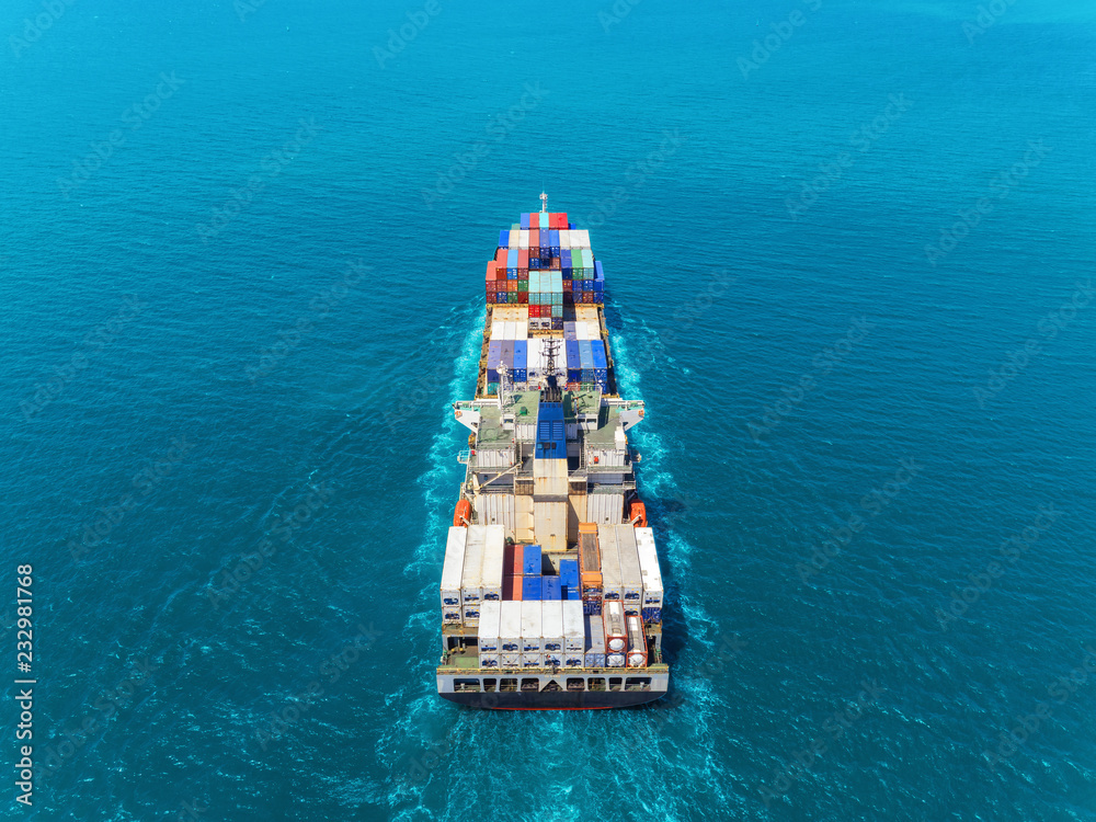 Aerial view container ship at sea full load container for logistics import  export or transportation concept background.
