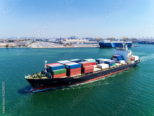 Container ship at sea port for logistics import export or transportation concept background.