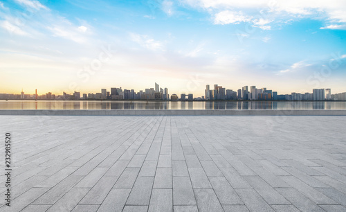Panoramic skyline and buildings with empty concrete square floor，hangzhou,china