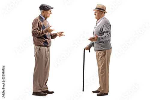 Full length shot of two elderly men having a conversation