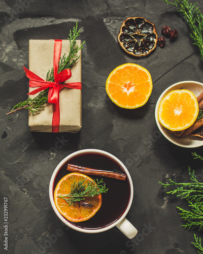 Mulled wine with spices and gifts. Happy New Year! Top view