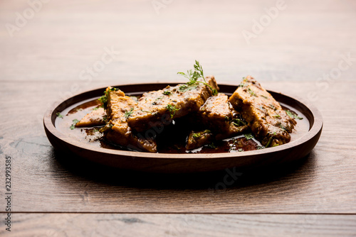 Patodi Rassa Bhaji or patwadi Sabji, a popular Maharashtrian spicy recipe served with Chapati and salad. Selective focus photo