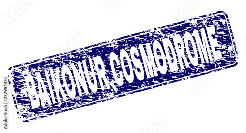 BAIKONUR COSMODROME stamp seal print with distress texture. Seal shape is a rounded rectangle with frame. Blue vector rubber print of BAIKONUR COSMODROME title with unclean texture.