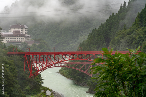 The Kurobe Gorge Railway (Kurobe Kyokoku Tetsudo) Trolley Train Red  Bridge at Kurobe Kyokoku, Kurobe, Toyama 黒部峡谷の橋 photo