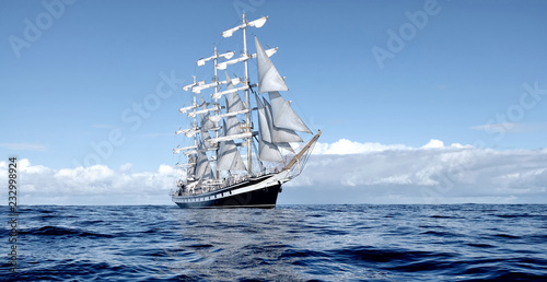 Obraz na plátně Sailing ship under white sails at the regatta