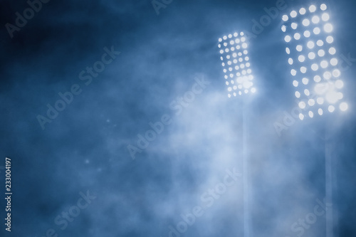 stadium lights and smoke photo