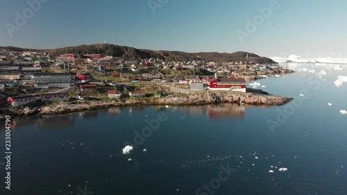 4k Greenland Aerial view of Ilulissat city along edge photo