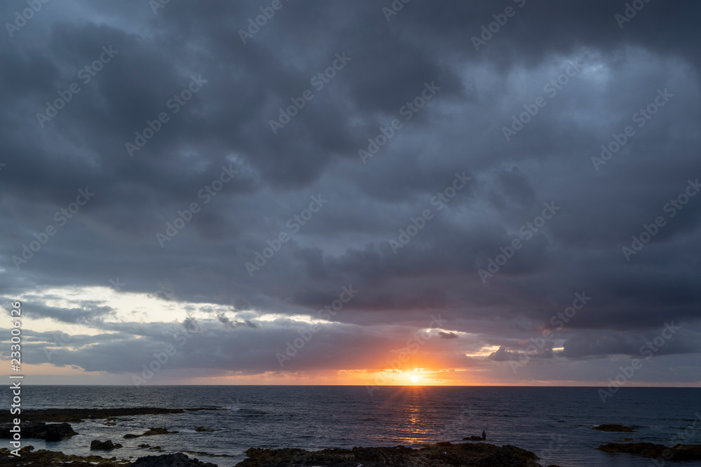 Obraz premium Scenic landscapes at sunset of the Punta del Hidalgo's lighthouse
