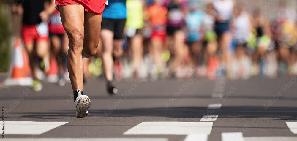 Marathon running race, people feet on city road