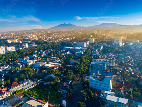 Aerial View of Bandung Cityscape, with Mount Tangkuban Parahu in the Background photo
