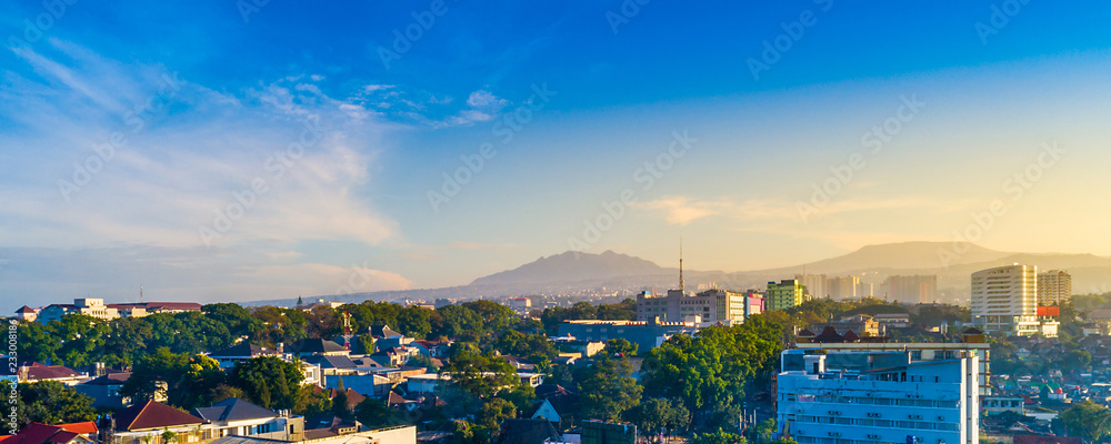 Aerial View of Bandung Cityscape, with Mount Tangkuban Parahu in the Background