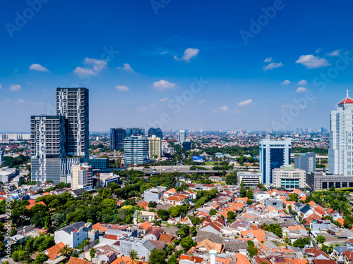 Aerial View of Jakarta Cityscape with Blue Sky