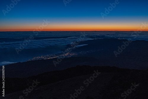 Sun is rising over Canary Islands, seen  from near the summit of Teide Mountain, Tenerife, Canary Islands, Spain © daniel damaschin