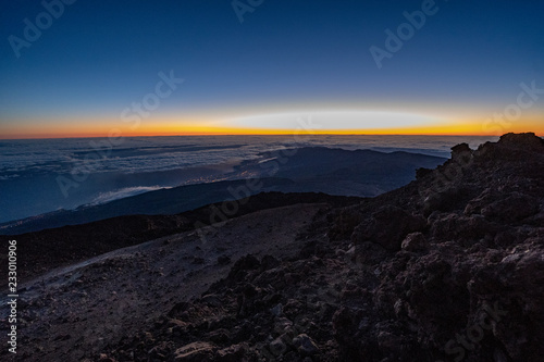 Sun is rising over Canary Islands, seen from near the summit of Teide Mountain, Tenerife, Canary Islands, Spain