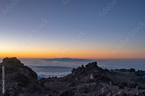 Sun is rising over Canary Islands  seen  from near the summit of Teide Mountain  Tenerife  Canary Islands  Spain