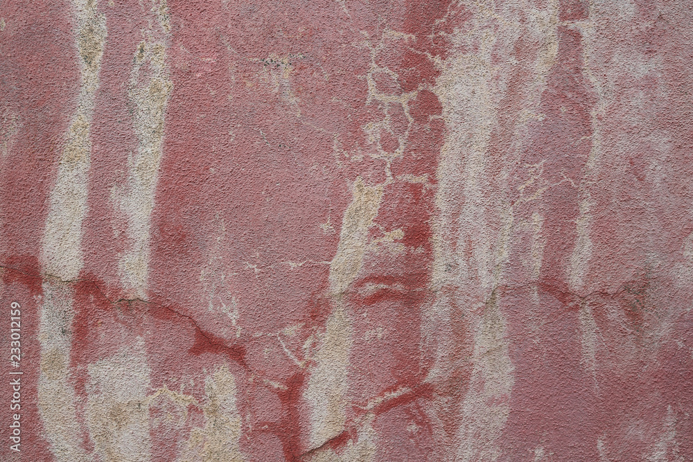 Obraz premium Wyspa Burano w pobliżu Wenecji: wyblakła kolorowa ściana domu (detal)