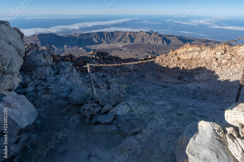 hikers reach the summit of Teide Mountain and enjoy the views from 3718 above sea level, Teide National Park, Tenerife, Canary Islands, Spain
