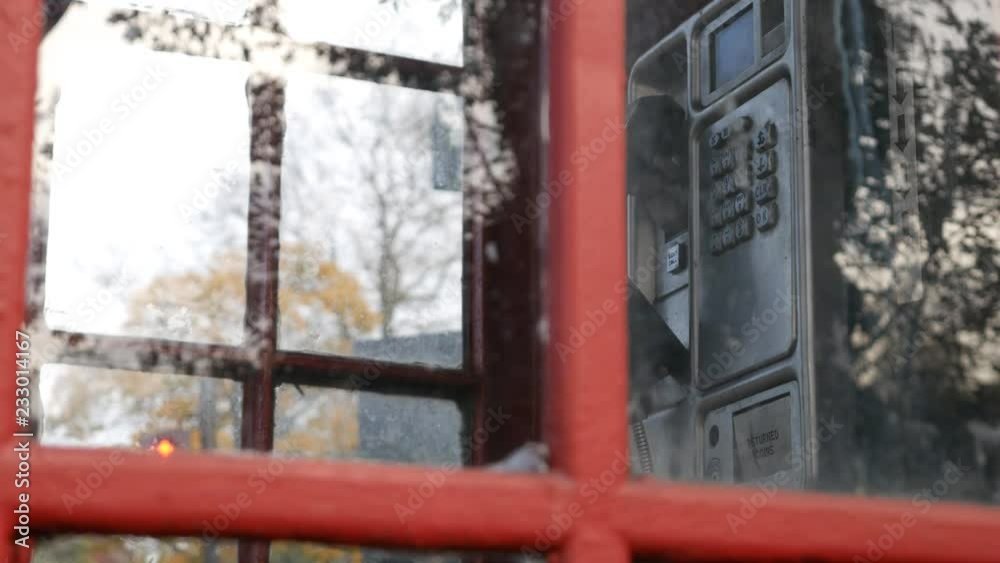 A close up view of a London telephone booth. A close up view of a London telephone booth.