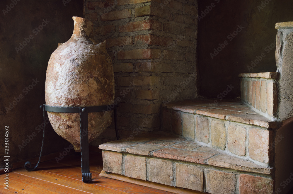 Roman amphora jug and old stairways Roman amphora jug and old stairways