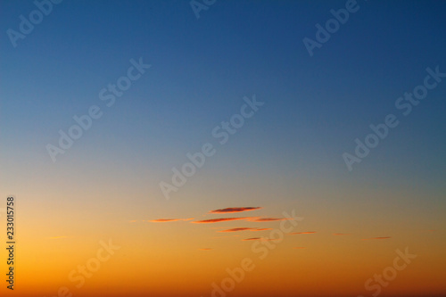 Fototapeta Naklejka Na Ścianę i Meble -  beautiful sunset clouds in the sky over the sea, bright colors of sunset