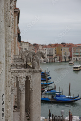 Stone sculptures looking down at Grand Canal in Venice 4968 © visualdiscovery