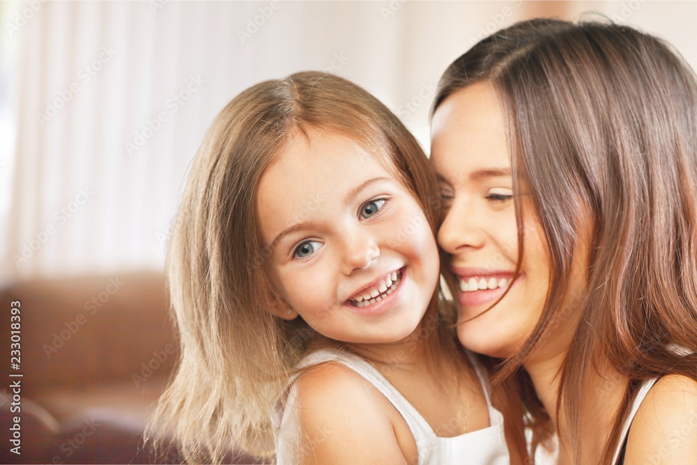 Happy Mother and daughter hugging Happy Mother and daughter hugging