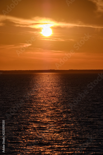 red saturated colors in sunset over the sea