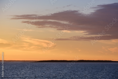red saturated colors in sunset over the sea
