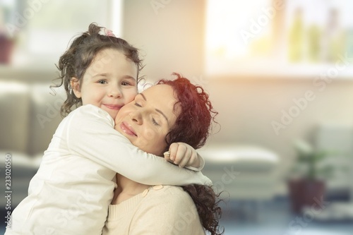 Happy Mother and daughter hugging, happy family, mothers day.