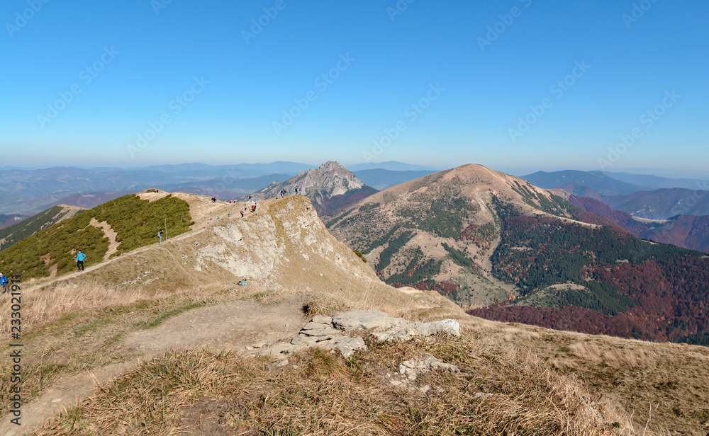 tourists walkin on a mountain trail in The Vratna valley. tourists walkin on a mountain trail in The Vratna valley.