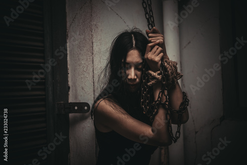 Canvas-taulu Asian hostage woman Bound with rope at night scene,The thieves kidnapped for ran