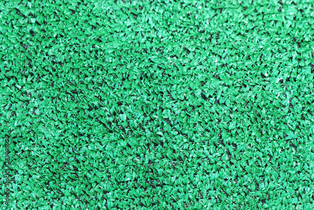 TEXTURA DE CERCA DE CÉSPED ARTIFICIAL TEXTURA DE CERCA DE CÉSPED ARTIFICIAL