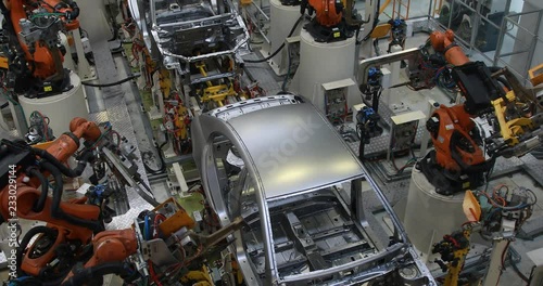 Automotive production line. Welding car body. Modern car Assembly plant