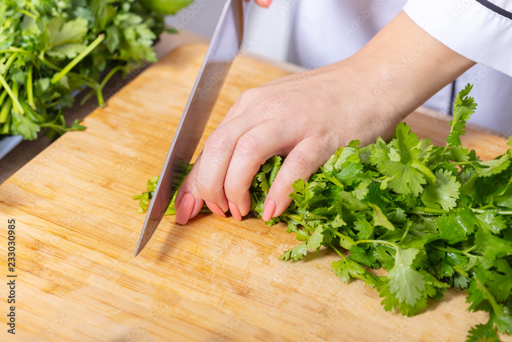 Cook chopped green coriander Cook chopped green coriander