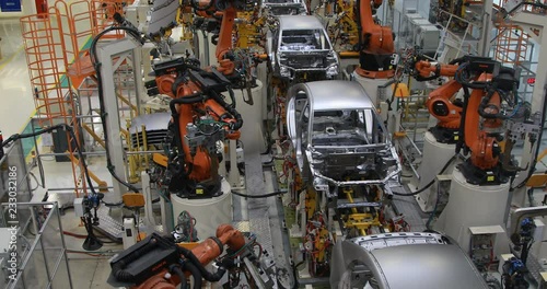 Automotive production line. Welding car body. Modern car Assembly plant