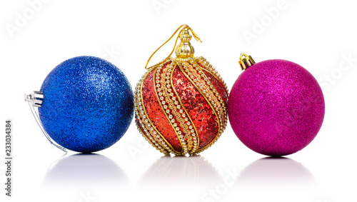 Christmas toys pink blue red golden ball on a white background isolation