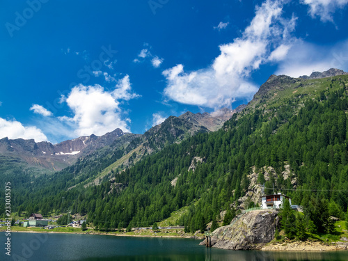 Lake Fontana Bianca, Weissbrunn hydroelectric plant and the Ortler Alps behind them, in Ulten Valley, Stelvio National Park, South Tyrol Italy © Stanislava